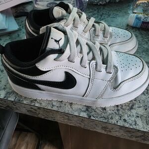 Kids Black and White Nike Sneakers
